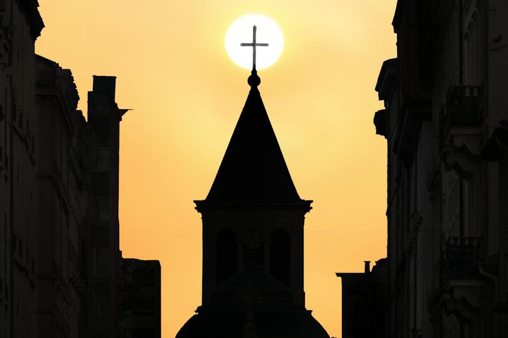 silhouette of buildings and church